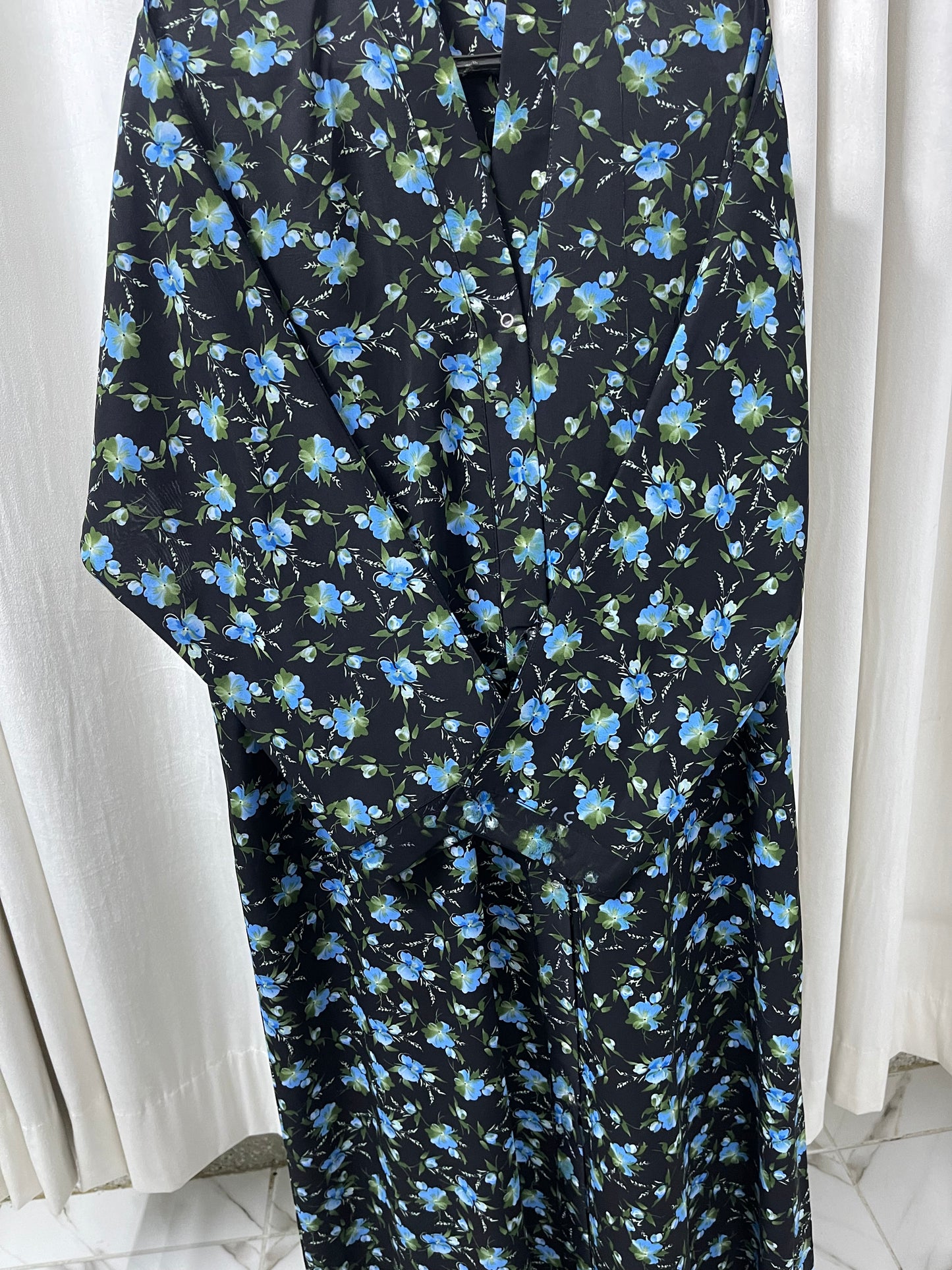 Black with blue green flowers