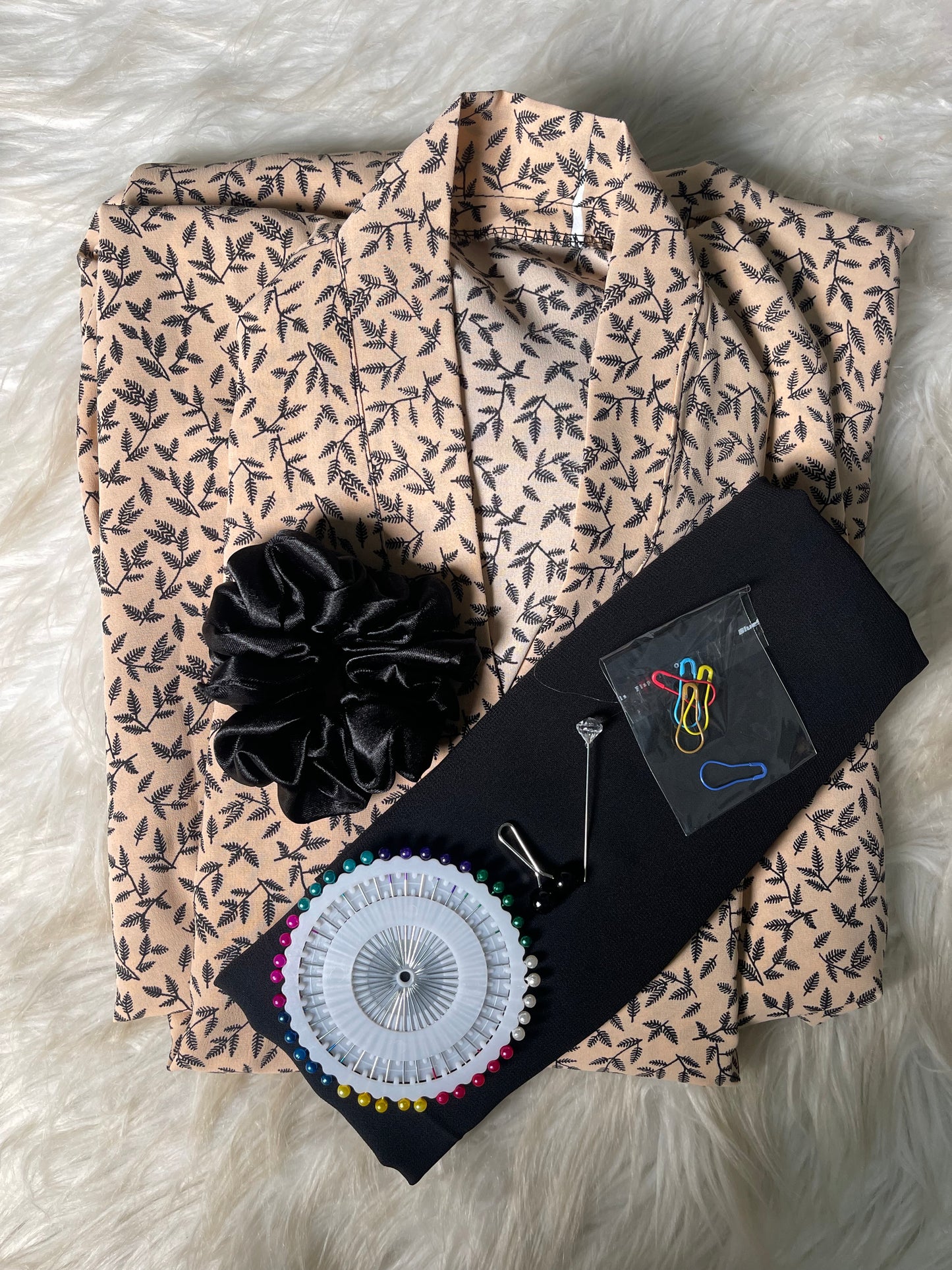 beige with black leaves