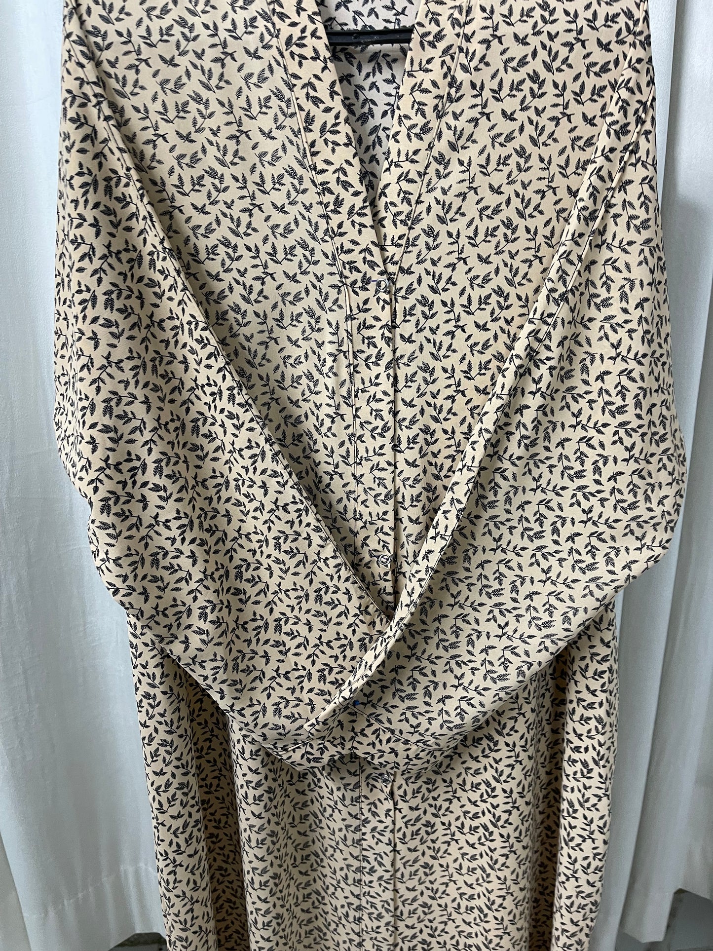 beige with black leaves