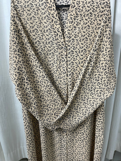 beige with black leaves